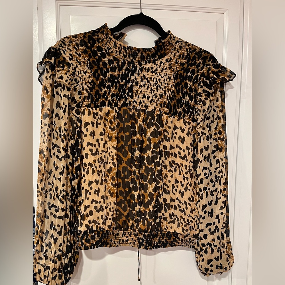 Free people out on the leopard blouse